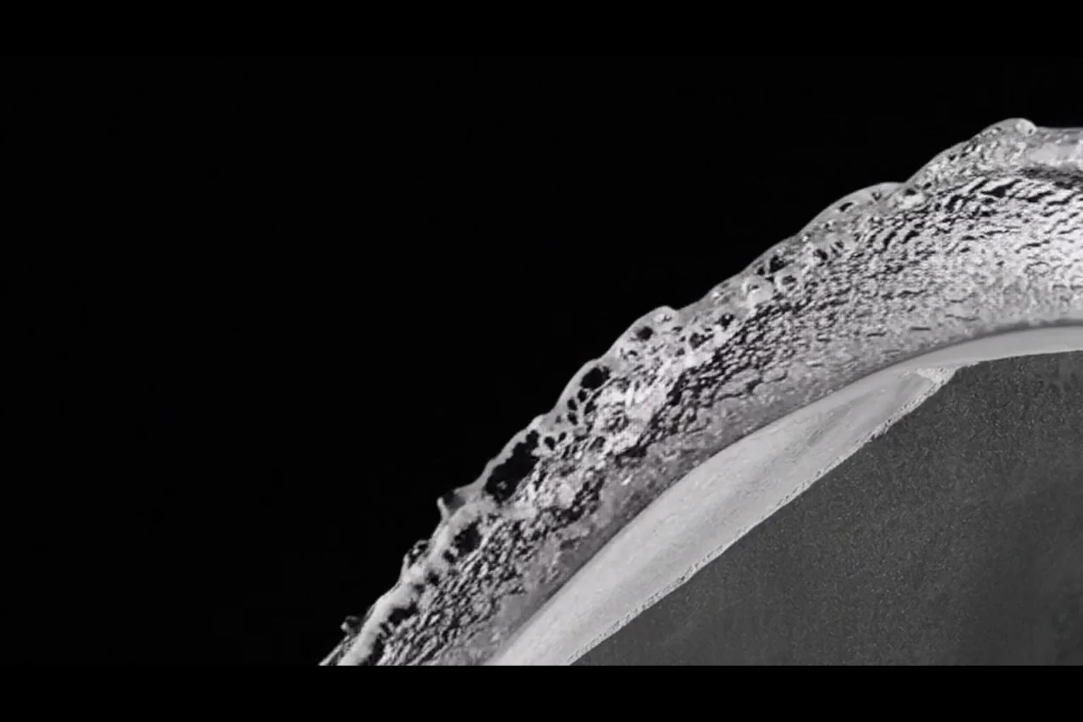 Aerated water moving over a sculptural concrete performance boundary
